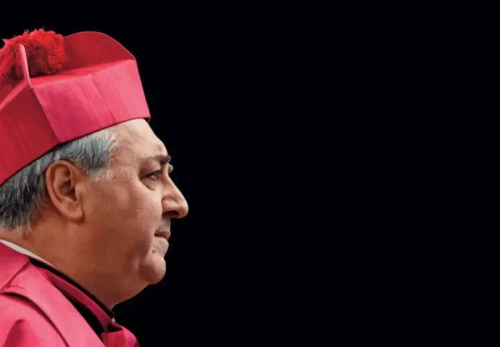 Portret mężczyzny w czerwonej birecie i szacie, przypominającej strój nuncjusza apostolskiego.