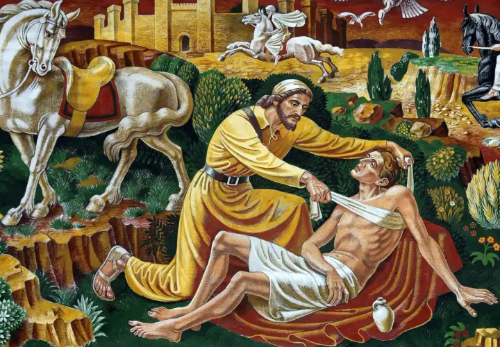 Dobry samarytanin opatruje rannego podróżnego. W tle widać konie i zamek.