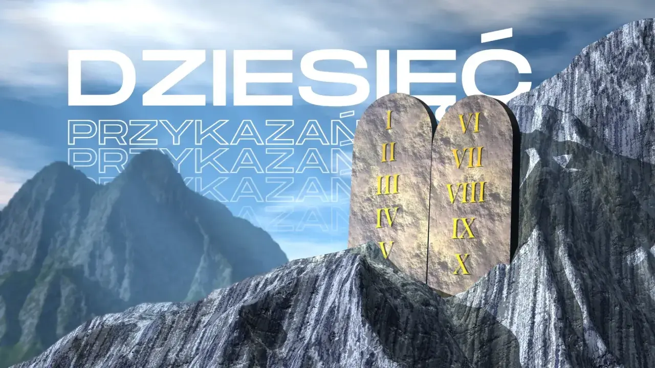 Kamienne tablice z Dziesięcioma Przykazaniami, symbolizujące dekalog z biblii, na tle gór.